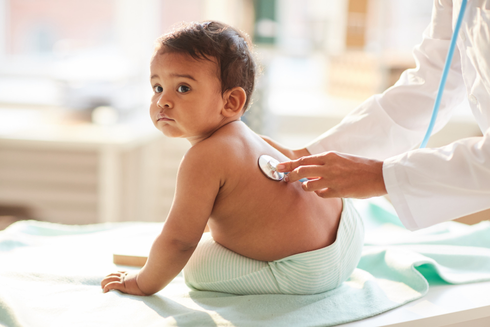 A cute baby getting treated.