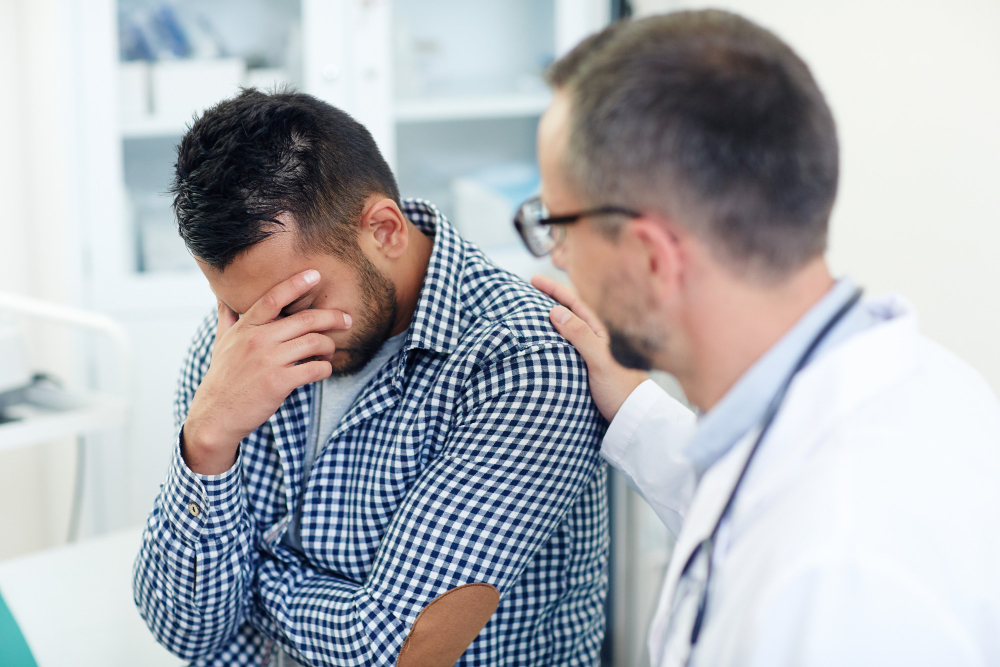 Doctor helping their stressed friend.